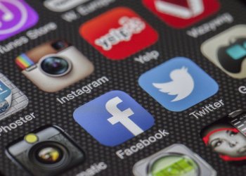 Coinbase App Hits Number One While Suffering Growing Pains