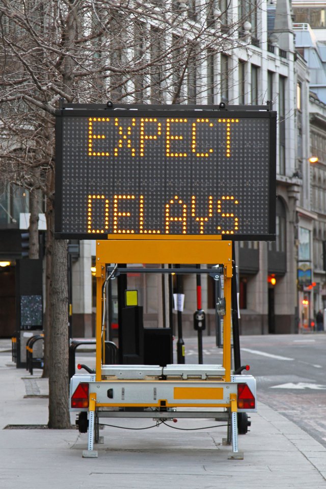 delay street sign