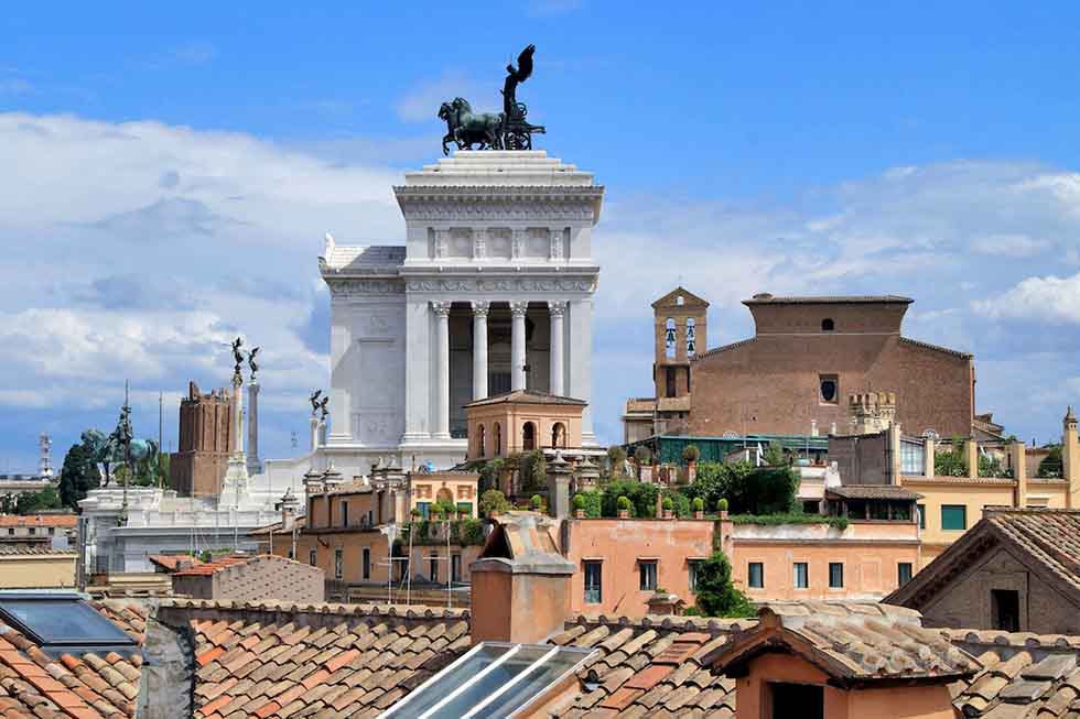 The rooftop terrace provides breathtaking views of the Eternal City.