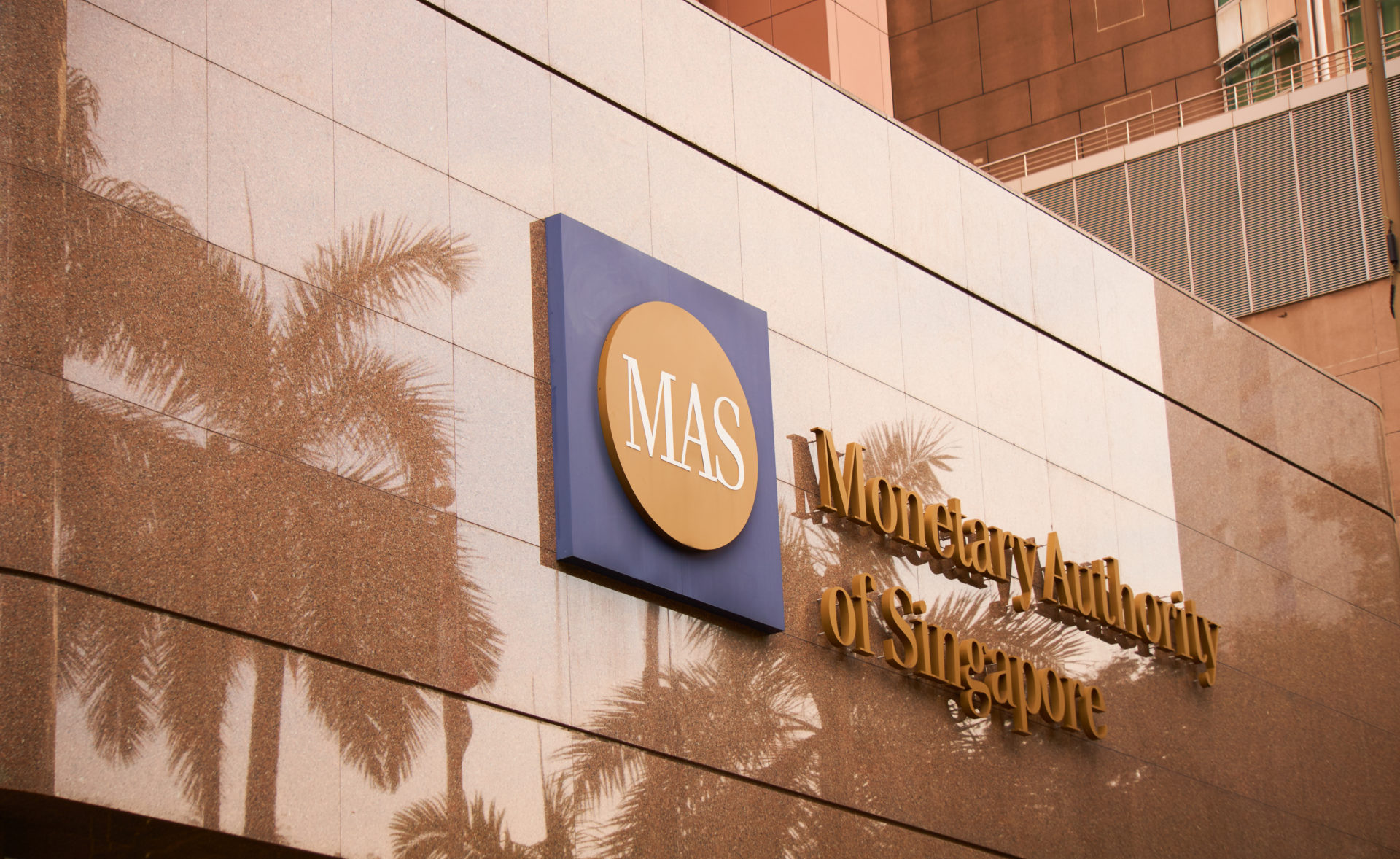 Singapore’s Central Bank Partners With Nasdaq, Deloitte on Settling Tokenized Assets