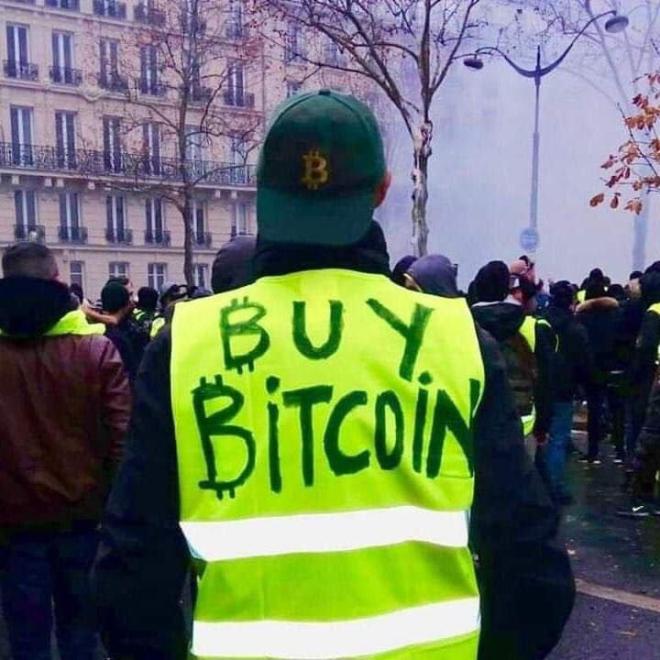 paris protests buy bitcoin