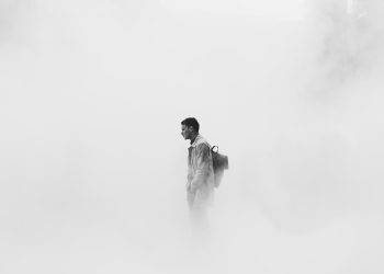 man in fog featured image for XRP article