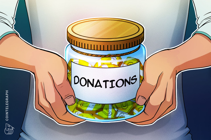 Hands holding a jar of coins with donations written on it