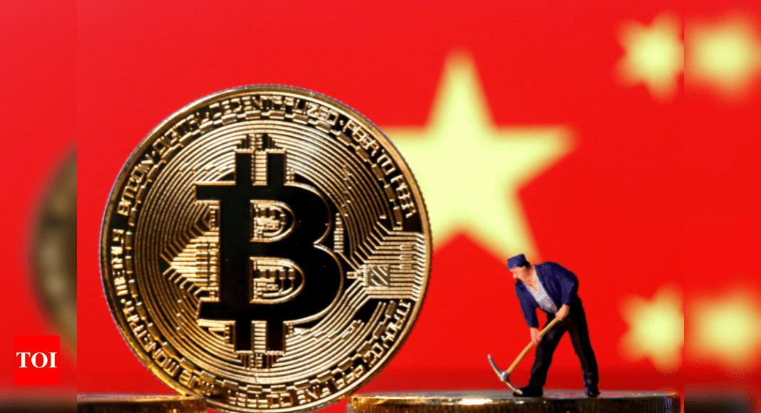 Man with pick axe mining bitcoin. A bitcoin standing in front of the Chinese flag