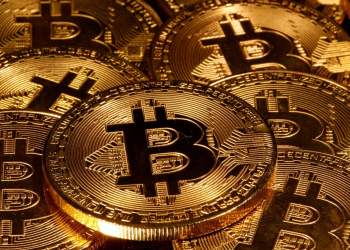 Picture of bitcoins laying on top each other