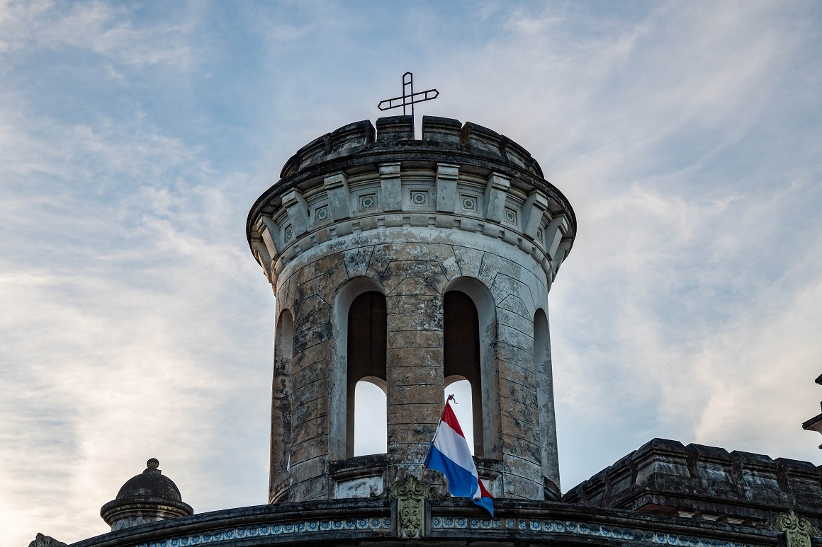 Paraguay, a castle top and the flag