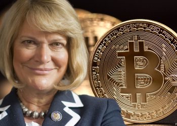 Picture of Senator Cynthia Lummis with a bitcoin right next to her