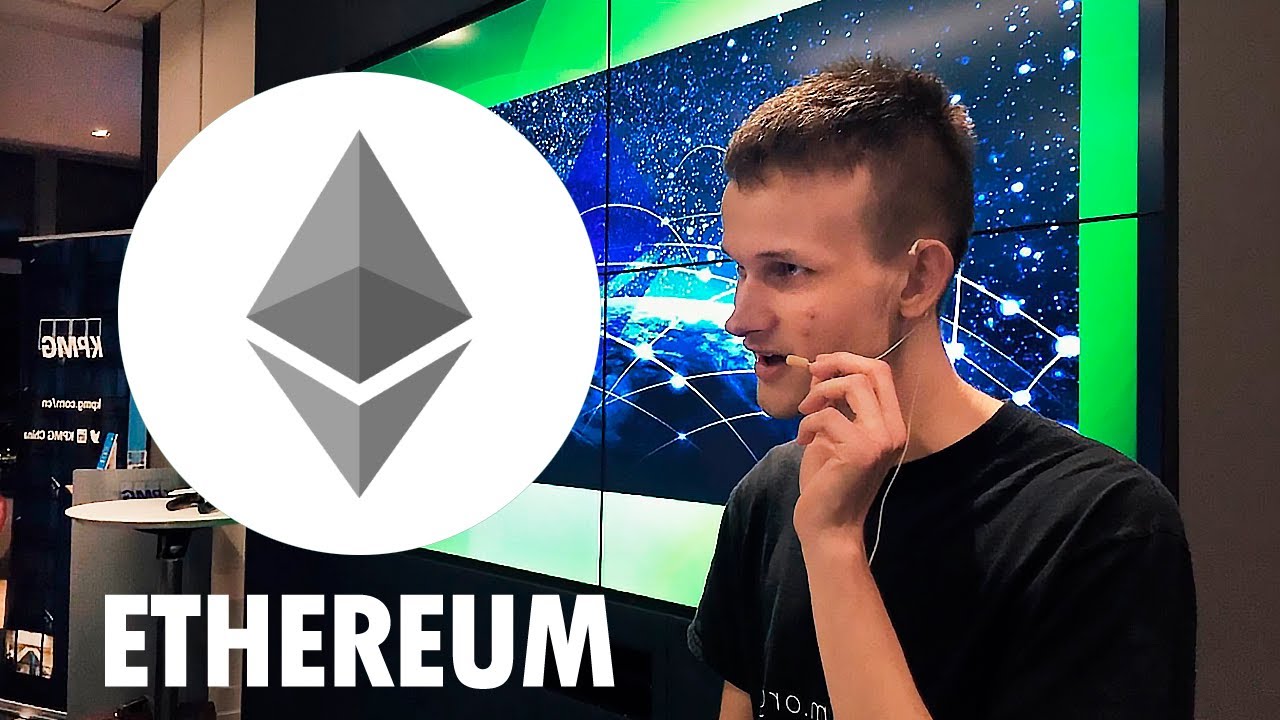 Picture of ethereum founder Vitalik Buterin with an Ethereum coin next to him