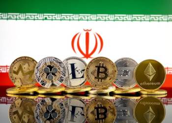 Cryptocurrency coins in front of Iran's flag
