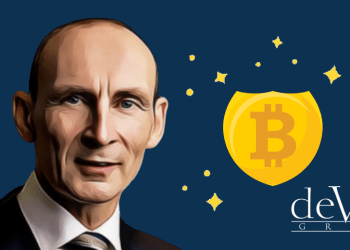 Picture of deVere CEO Nigel Green, next to a Bitcoin plaque with deVere Group written under it