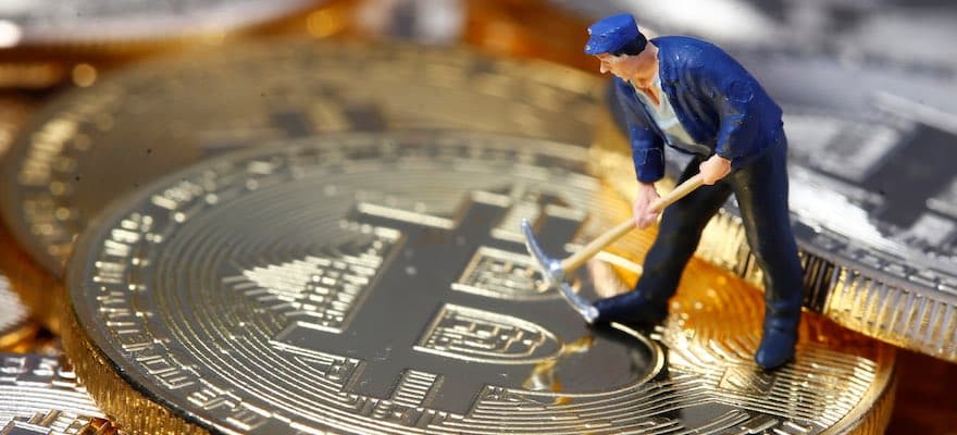 bitcoin Picture of a figurine with a pick axe mining bitcoin