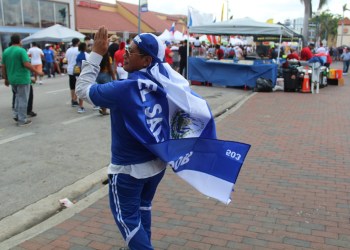 National Review, man dressed with El Salvador's colors