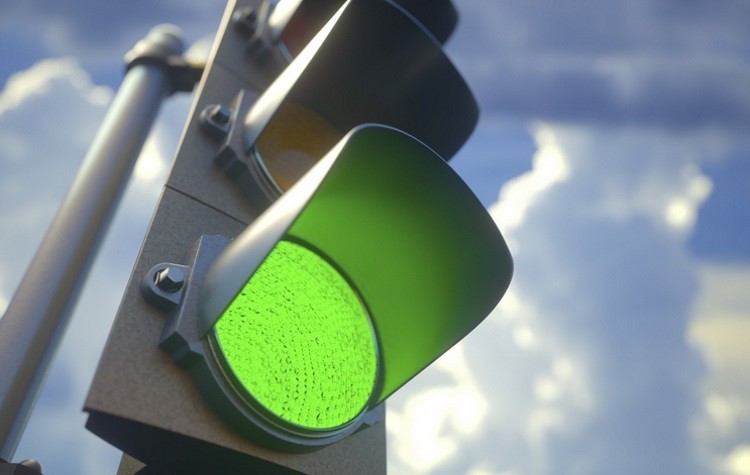 Picture of a traffic light showing green