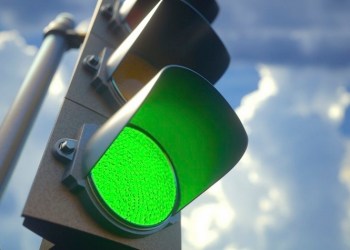 Picture of a traffic light showing green