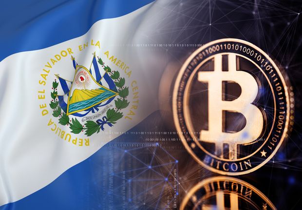 Picture of a bitcoin next to an El Salvador flag