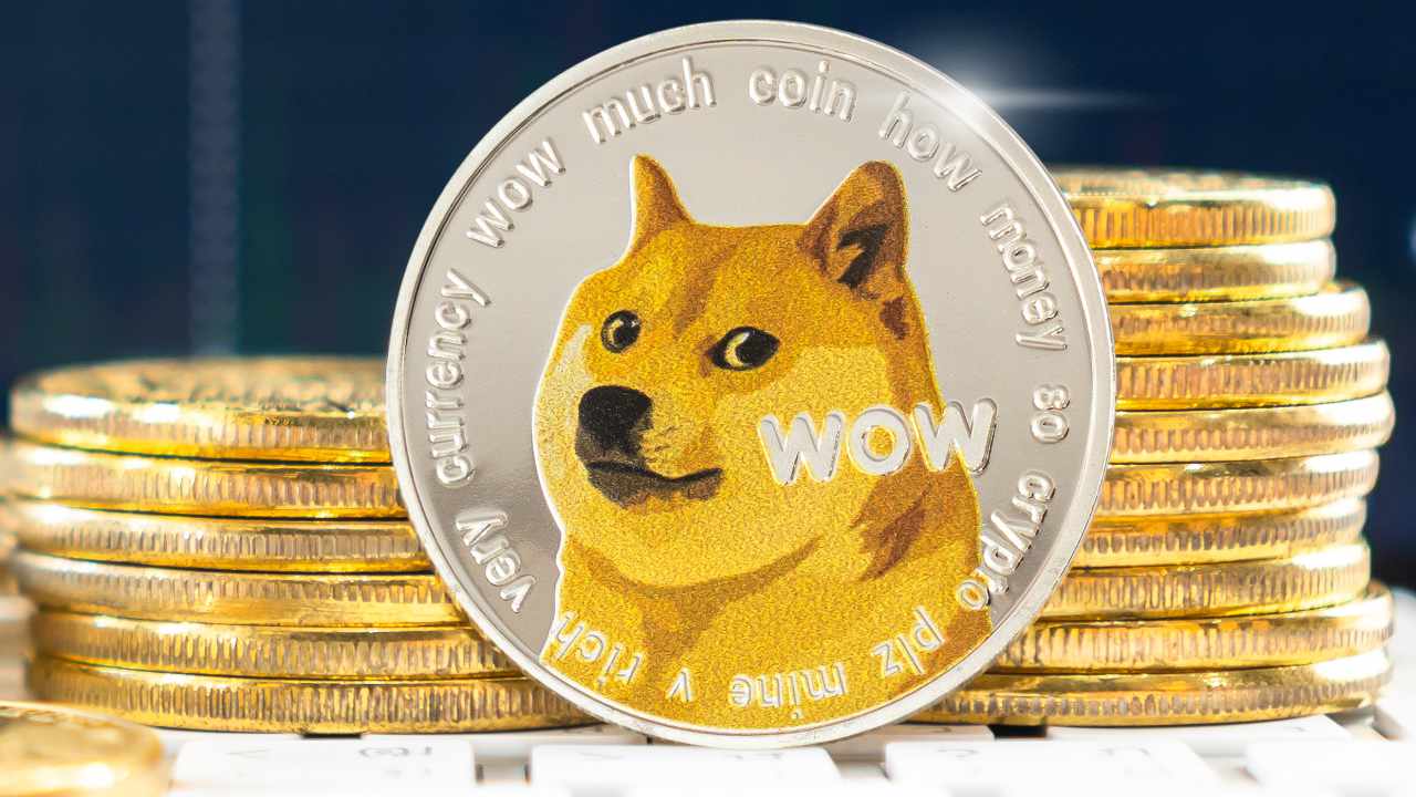Picture of a dogecoin with stacks of dogecoins next to it