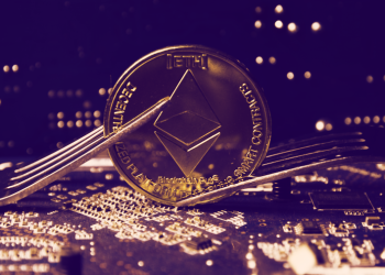 Picture of an Ethereum coin on a circuit board