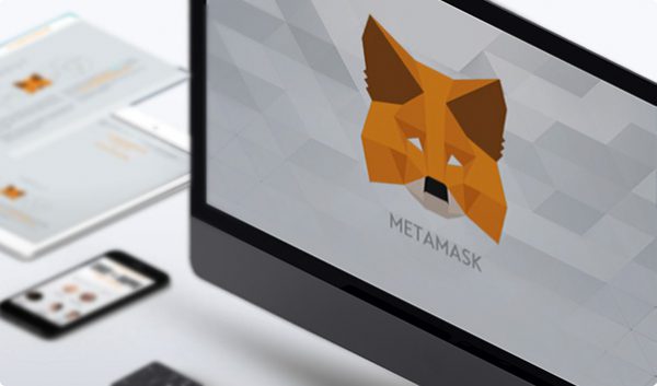Picture of a MetaMask wallet logo on a computer screen