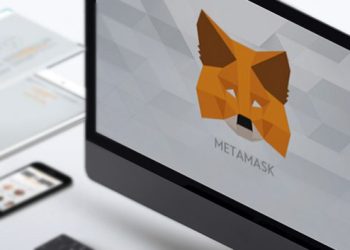 Picture of a MetaMask wallet logo on a computer screen