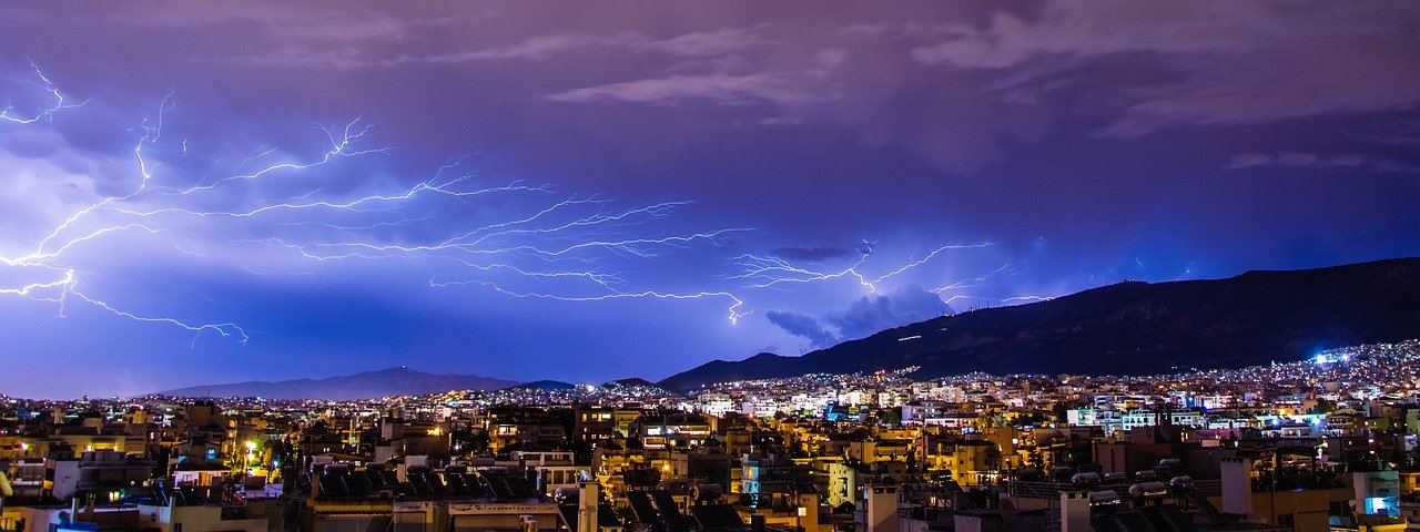 The Lightning Network. Lightning over a city