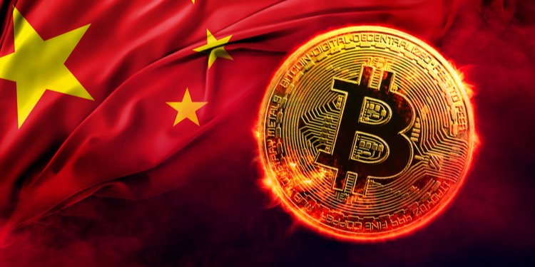 A bitcoin in front of a Chinese flag