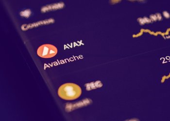 Picture of a trading app on a mobile phone with the $AVAX market open