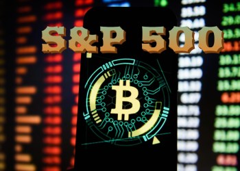 Bitcoin and the S&P in front of a market chart