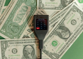 AOPP, a Trezor over a bunch of dollars