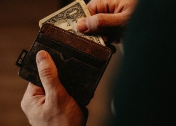 Fingerprint sensor, a normal wallet with a one dollar bill