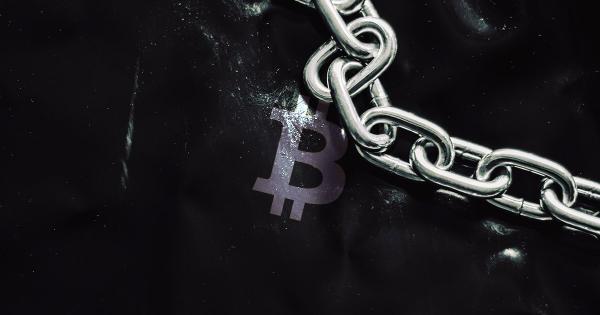 Bitcoin with chain next to it