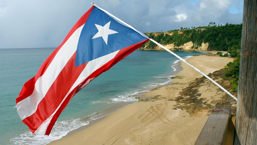 Puerto Rico flag and a beach