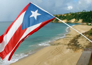 Puerto Rico flag and a beach