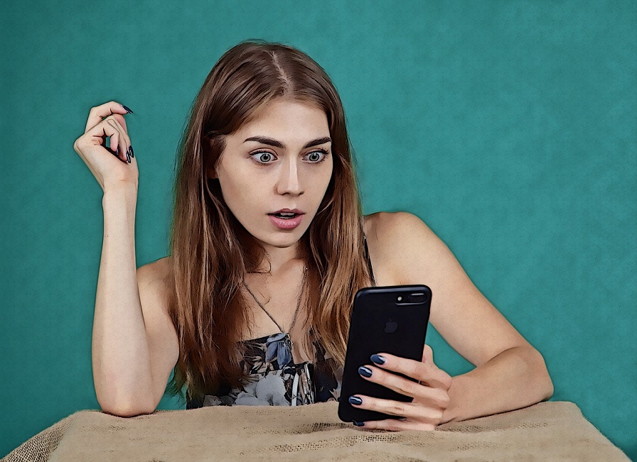 NY Times, a surprised girl looking at a phone