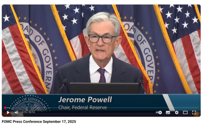 Chairman Powell speaking at the FOMC press conference.