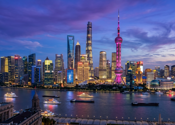 Editorial illustration of the Shanghai Pudong metropolitan financial skyline across the Huangpu River